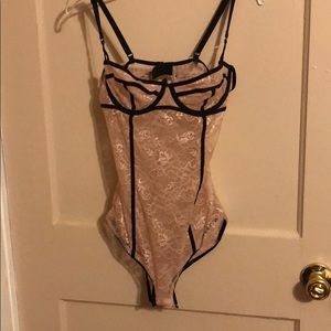 Pink lace lingerie with black trim